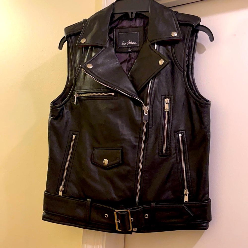 Sam Edelman is the designer.  Black genuine leather designer vest.